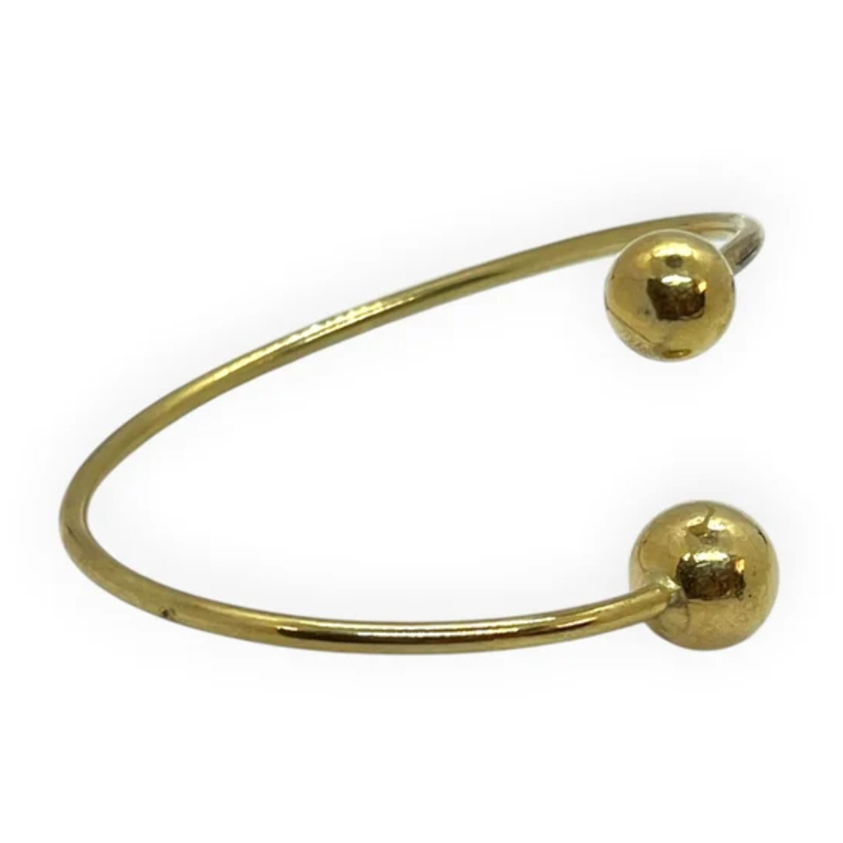Pulsera aro laton y doble bola en chapado dorado