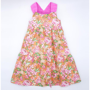 Vestido midi de popelín ocre flores rosas. Falda de volantes y tirantes cruzados en la espalda.