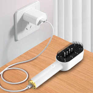 Pettine multifunzionale per capelli, con vibrazione e trattamento di luce.
