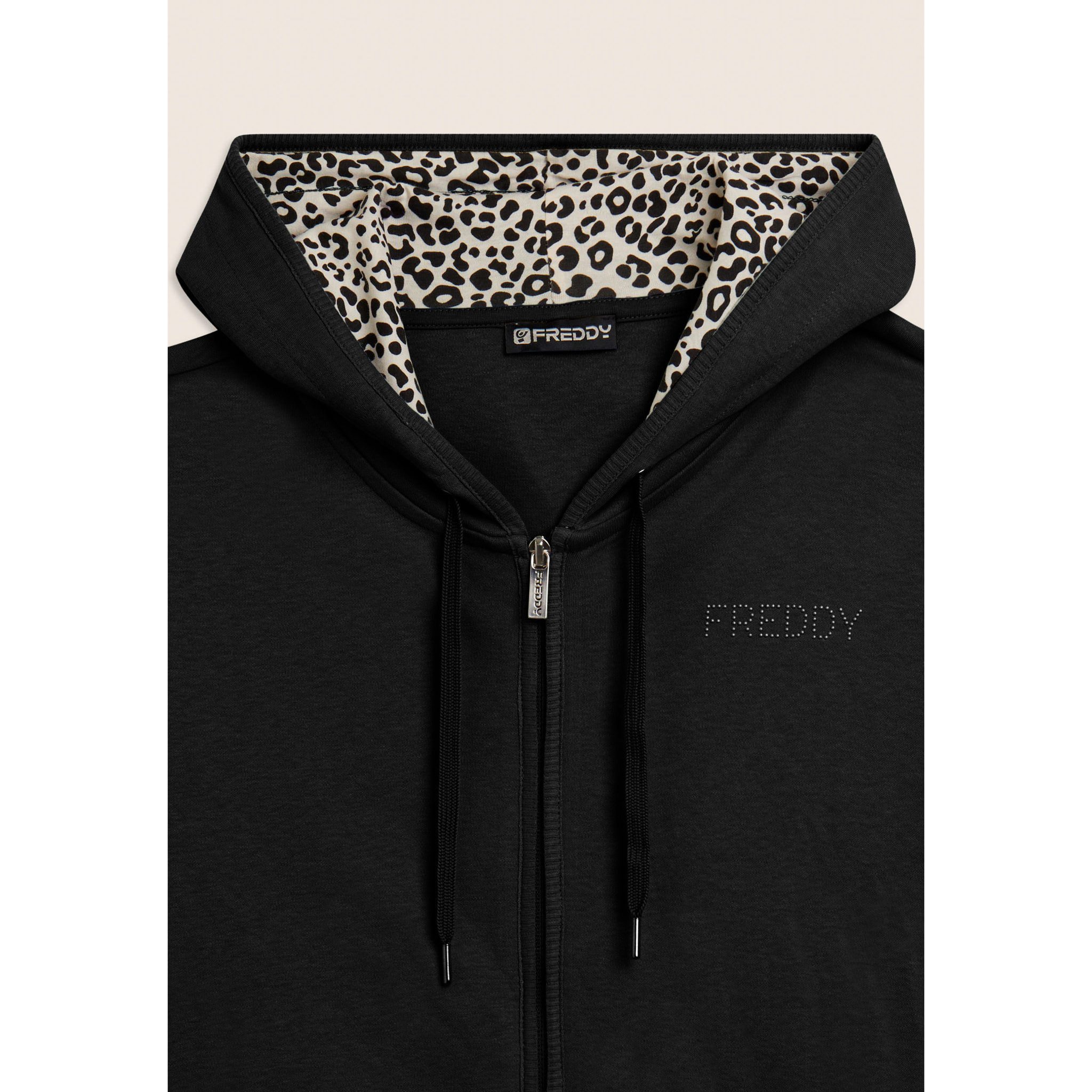 Tuta con zip e cappuccio con interno animalier