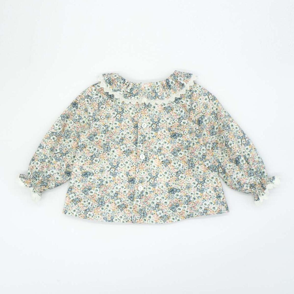 Blusa flores con volante