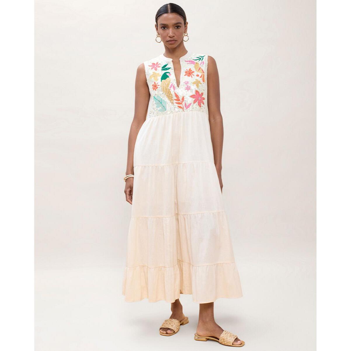 Abito con volant a pappagallo