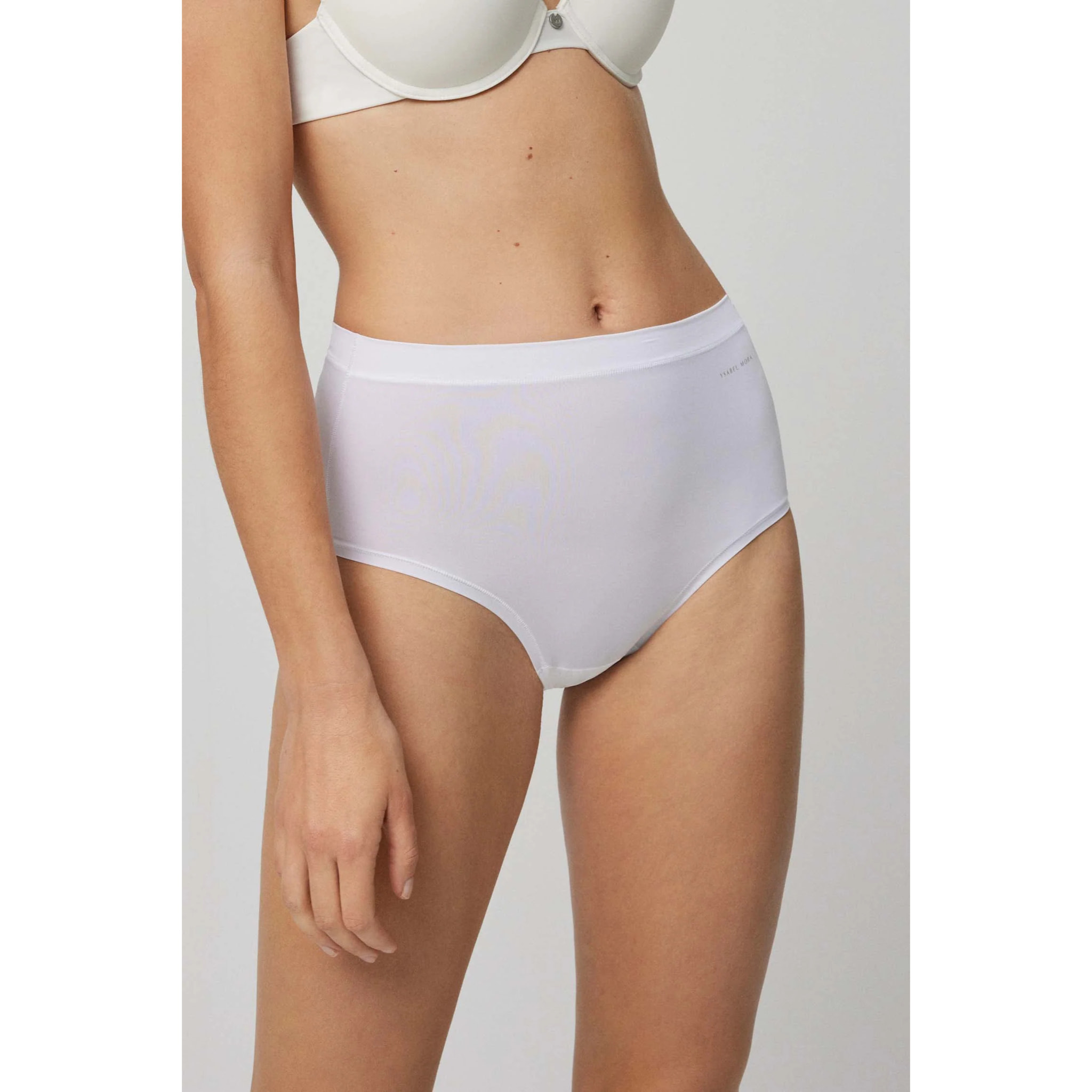 Slip a vita alta adattabili con finiture bianche invisibili
