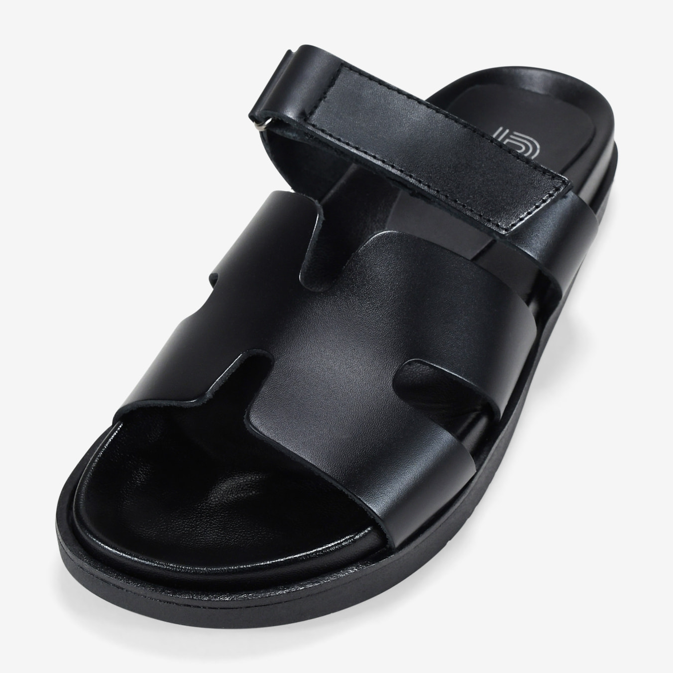 Sandalias planas negras en piel