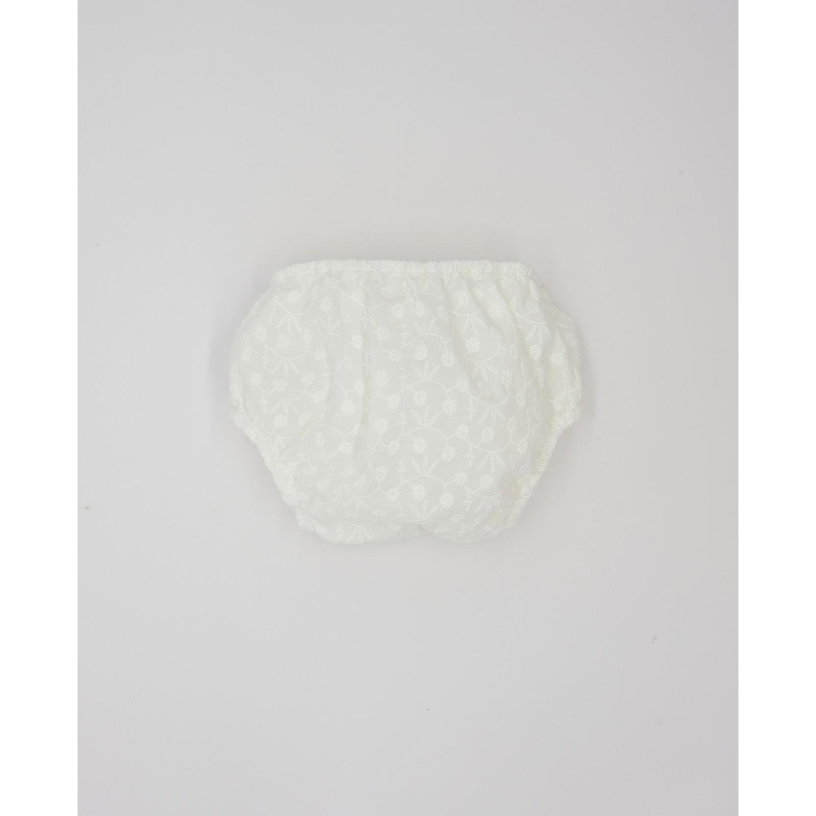 Cubrepañal de bordado flores. Elastico en la cintura y en las piernas.