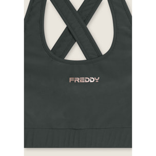 Top tecnico con spalline incrociate e profili bianchi