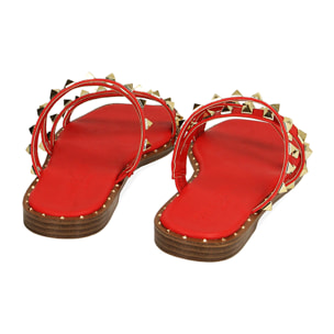 Sandalias planas rojas con tachuelas