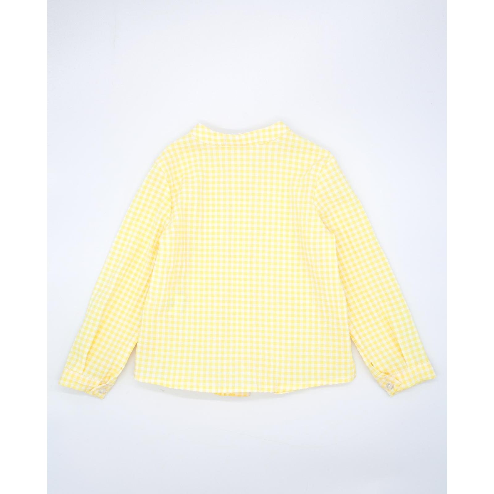 Camisa de manga larga estampado de vichy amarillo. Cuello mao y bolsillo en el delantero.