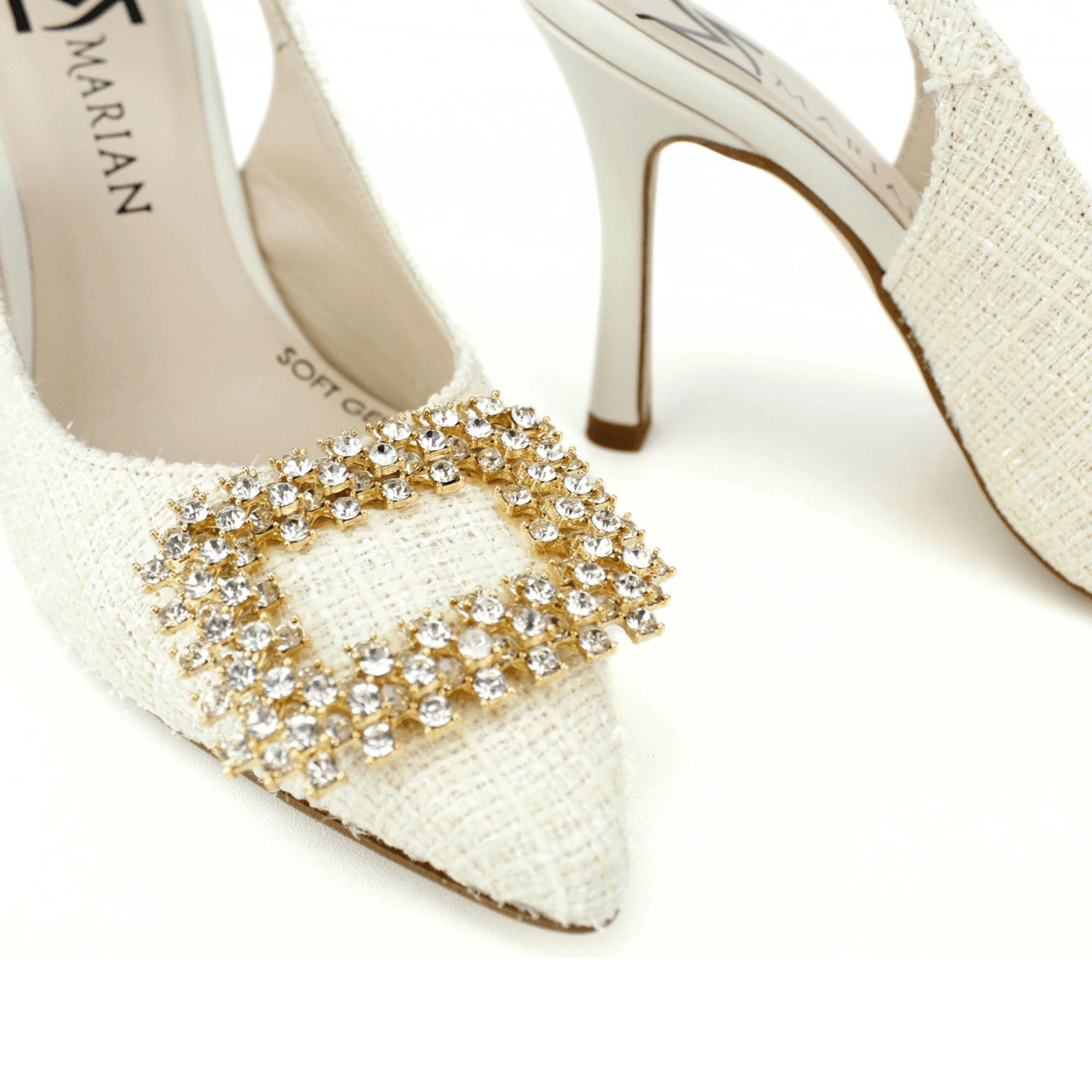 Salón destalonado en chanel blanco. Tacón fino de 9cm