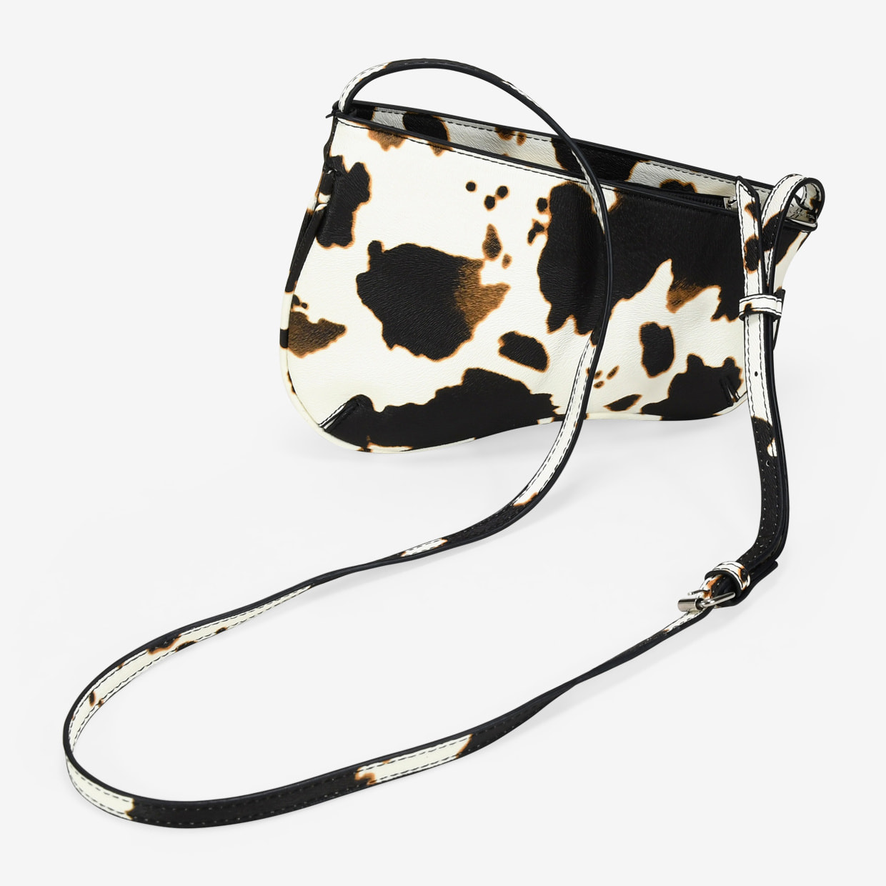 Bolso bandolera con estampado de vaca y cremallera