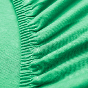 Sábana bajera 90-100x200cm en color verde 100% algodón rainbow benetton