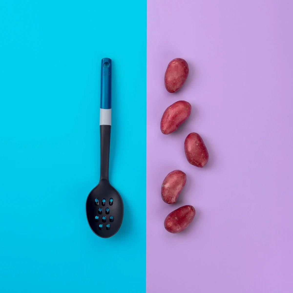 Cuillère de service ajourée avec fonction râpe à fromage Tasty Core