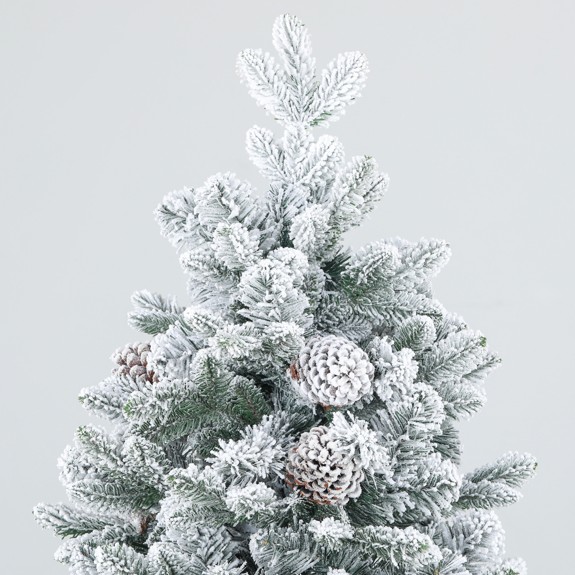 Sapin de Noël artificiel H.180 cm 1489 branches enneigées 33 pommes de pin métal PVC PE vert blanc