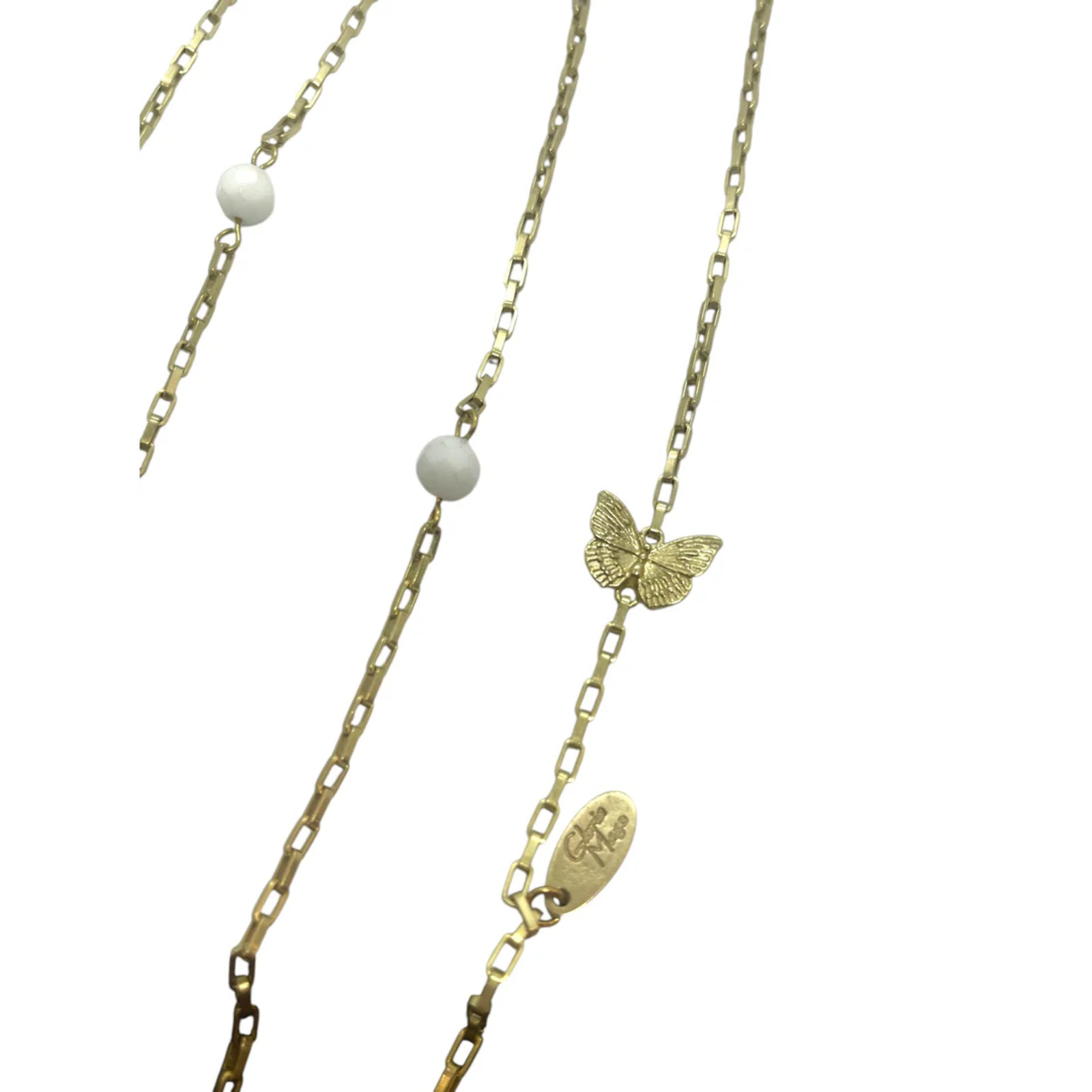Colar largo multiposición mariposas y cristal dorado y blanco