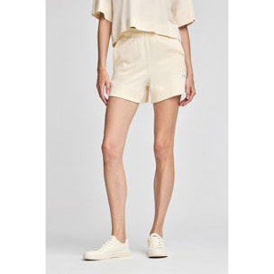 Pantaloncini in cotone ecrù con logo ricamato