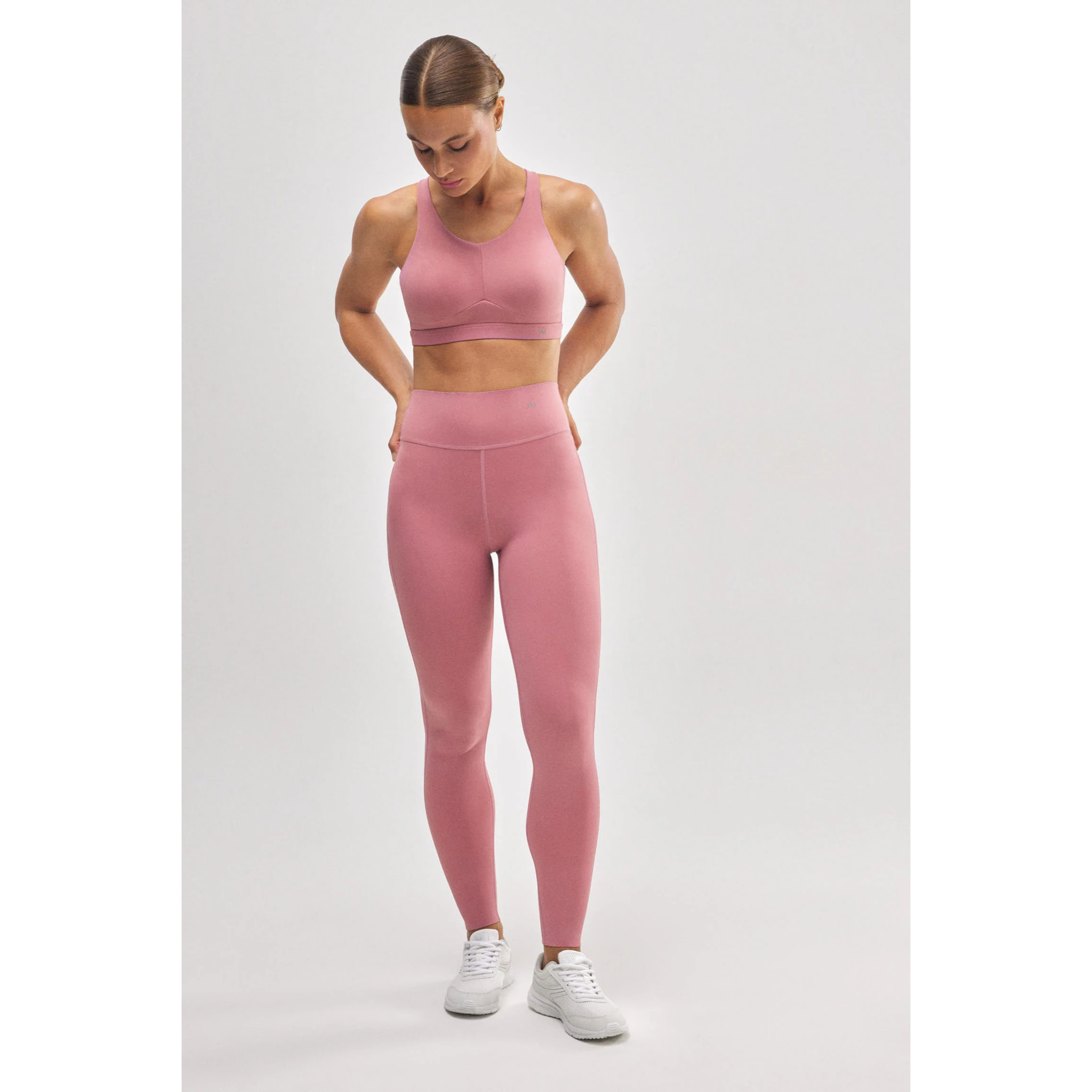 Leggings sportivi rosa effetto pancia piatta