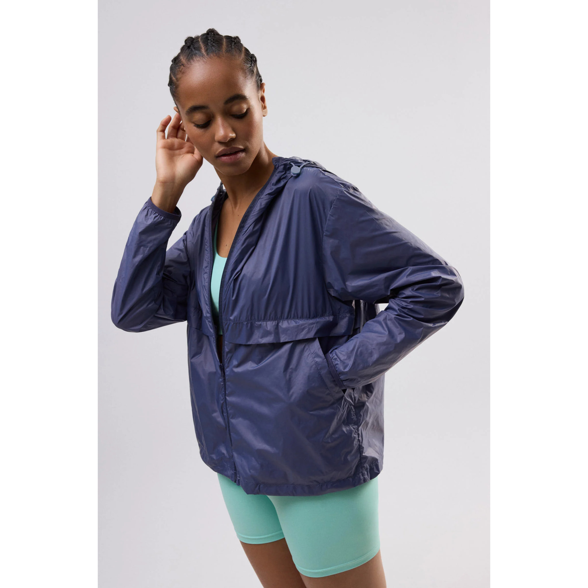 Giacca sportiva pieghevole grigia con cappuccio regolabile